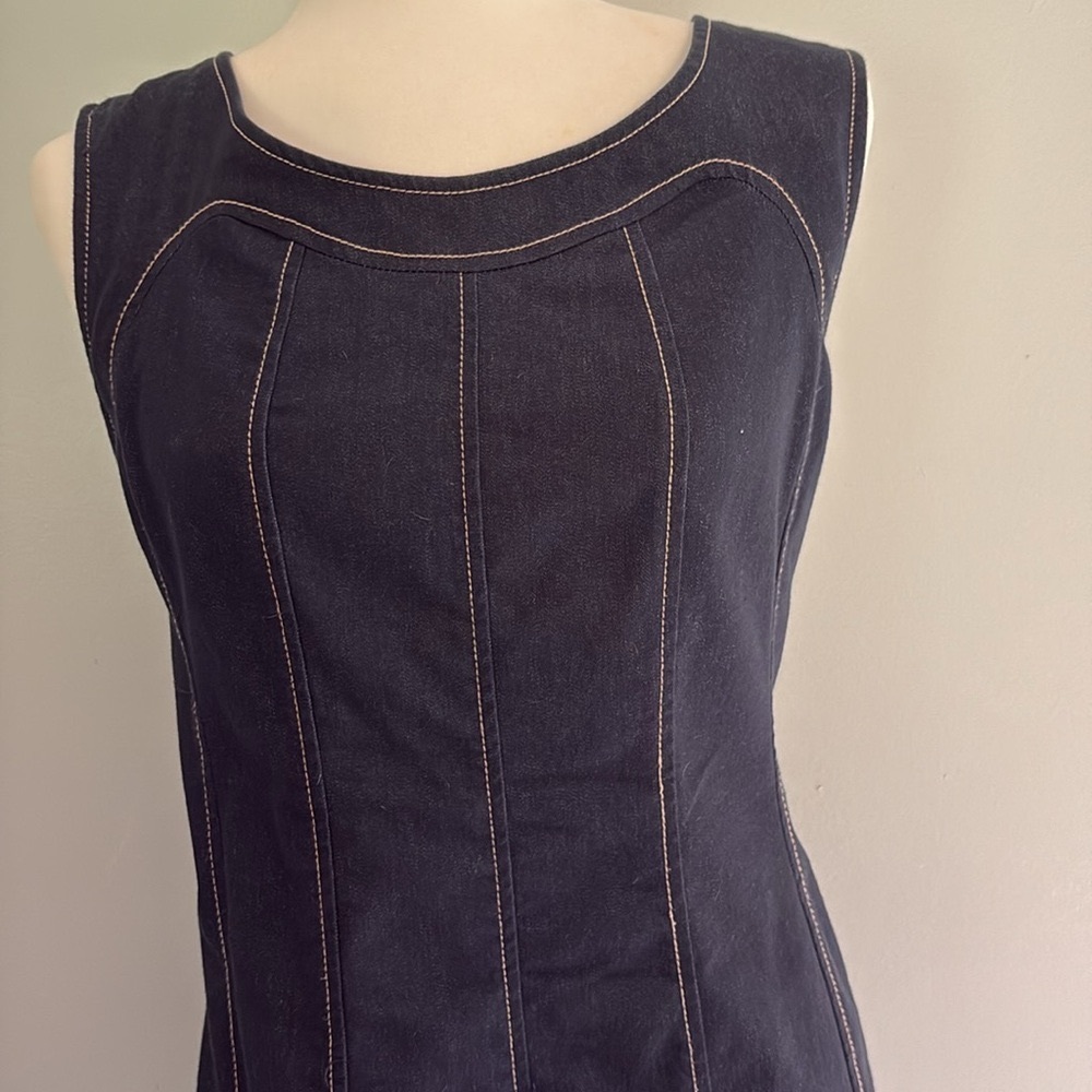 Women’s adorable denim dress with detail stitching.
